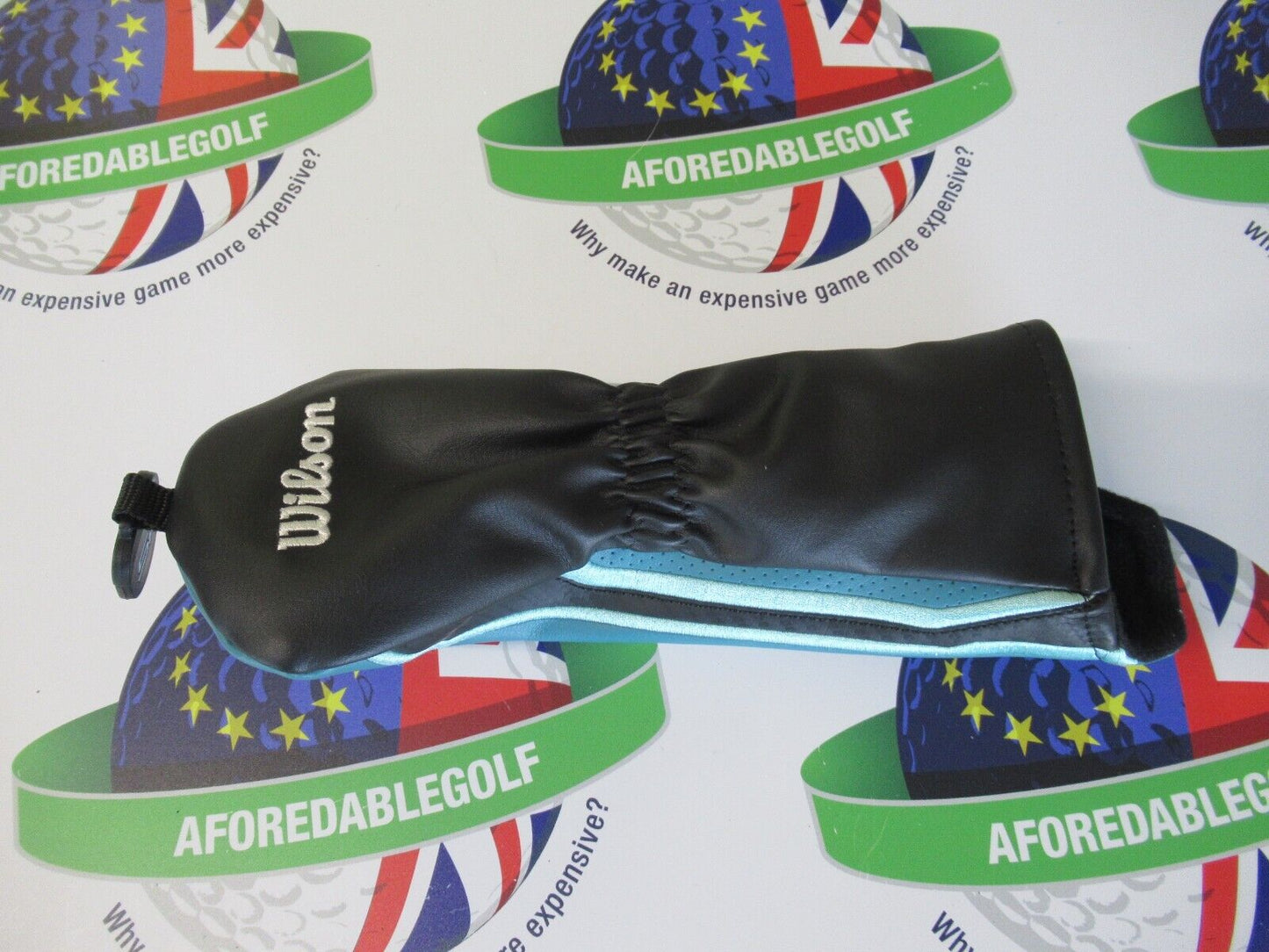 used wilson staff d9 turquoise/silver hybrid/rescue cover