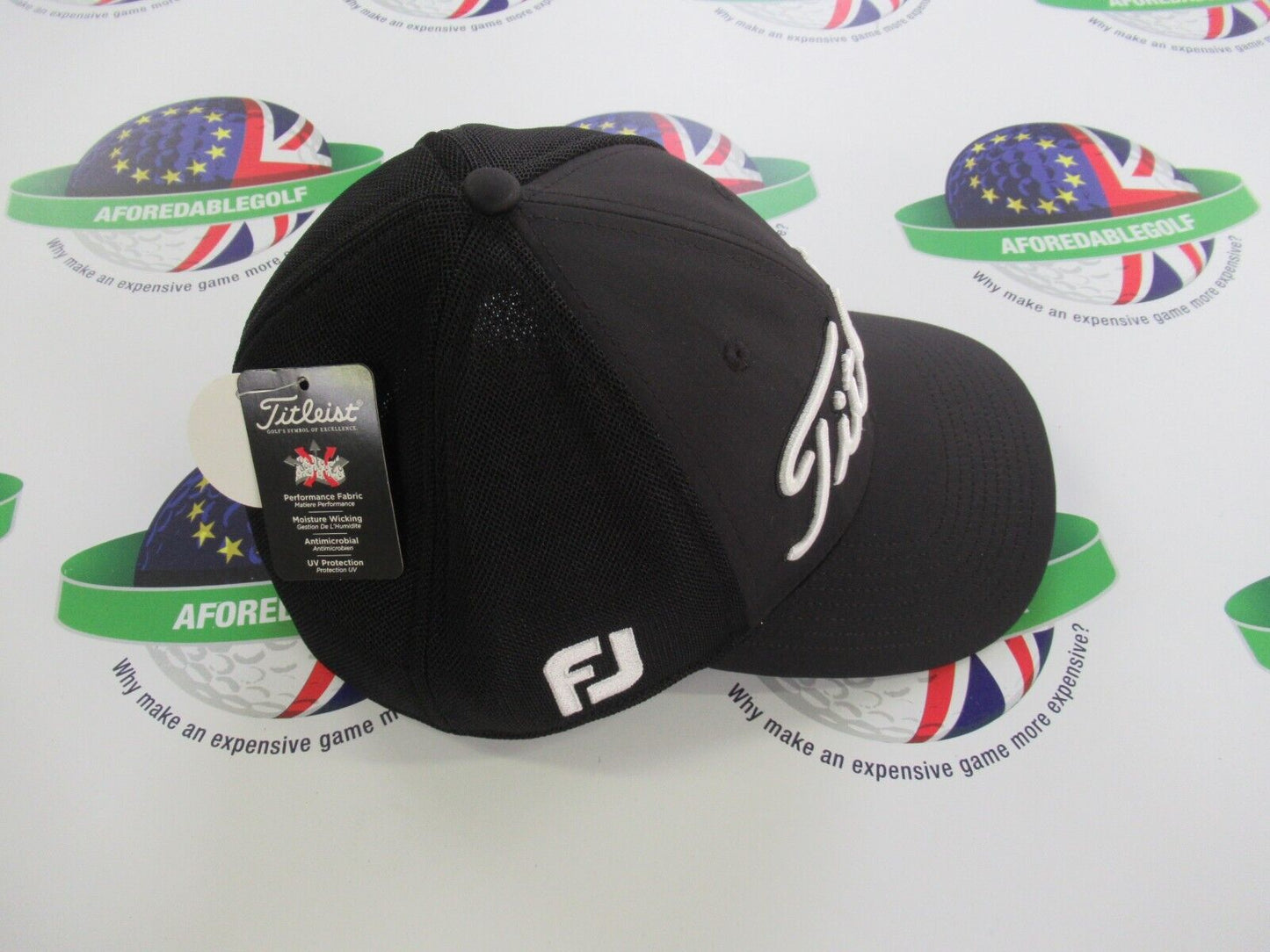 titleist tour sports mesh black large/xl fitted golf cap with team titleist logo